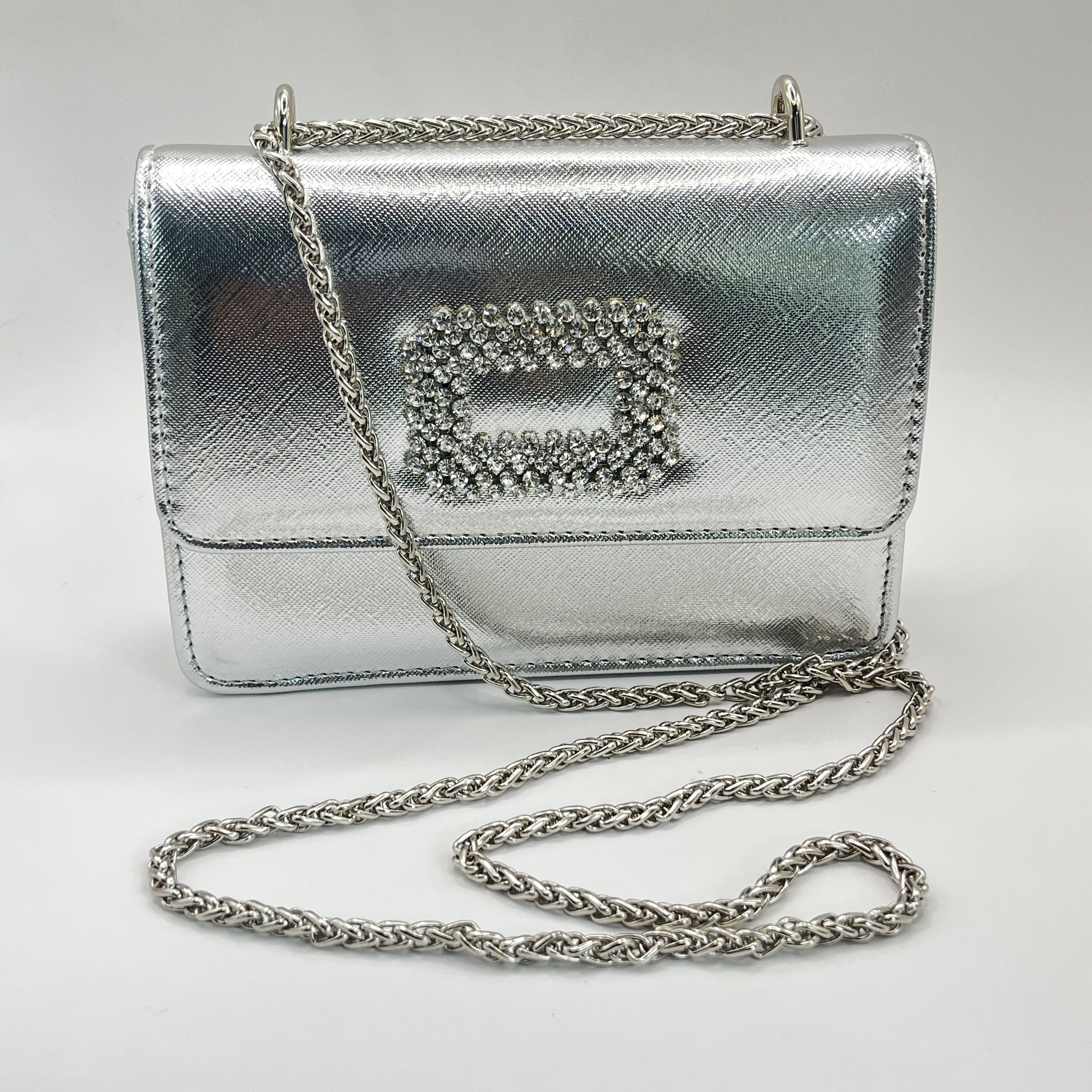 Cartera de fiesta con hebilla brillante plateada 1