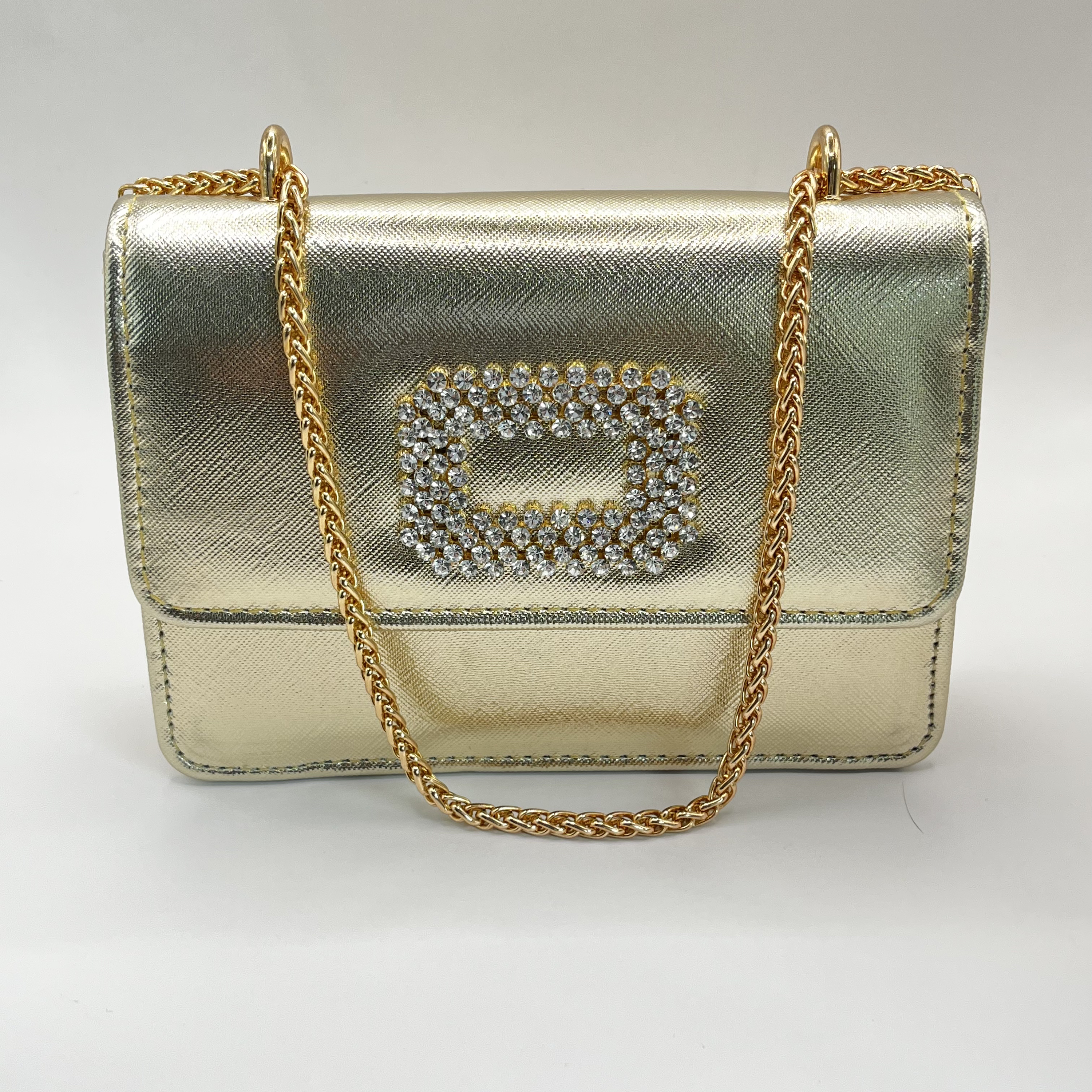 Cartera de fiesta con hebilla brillante dorada 1