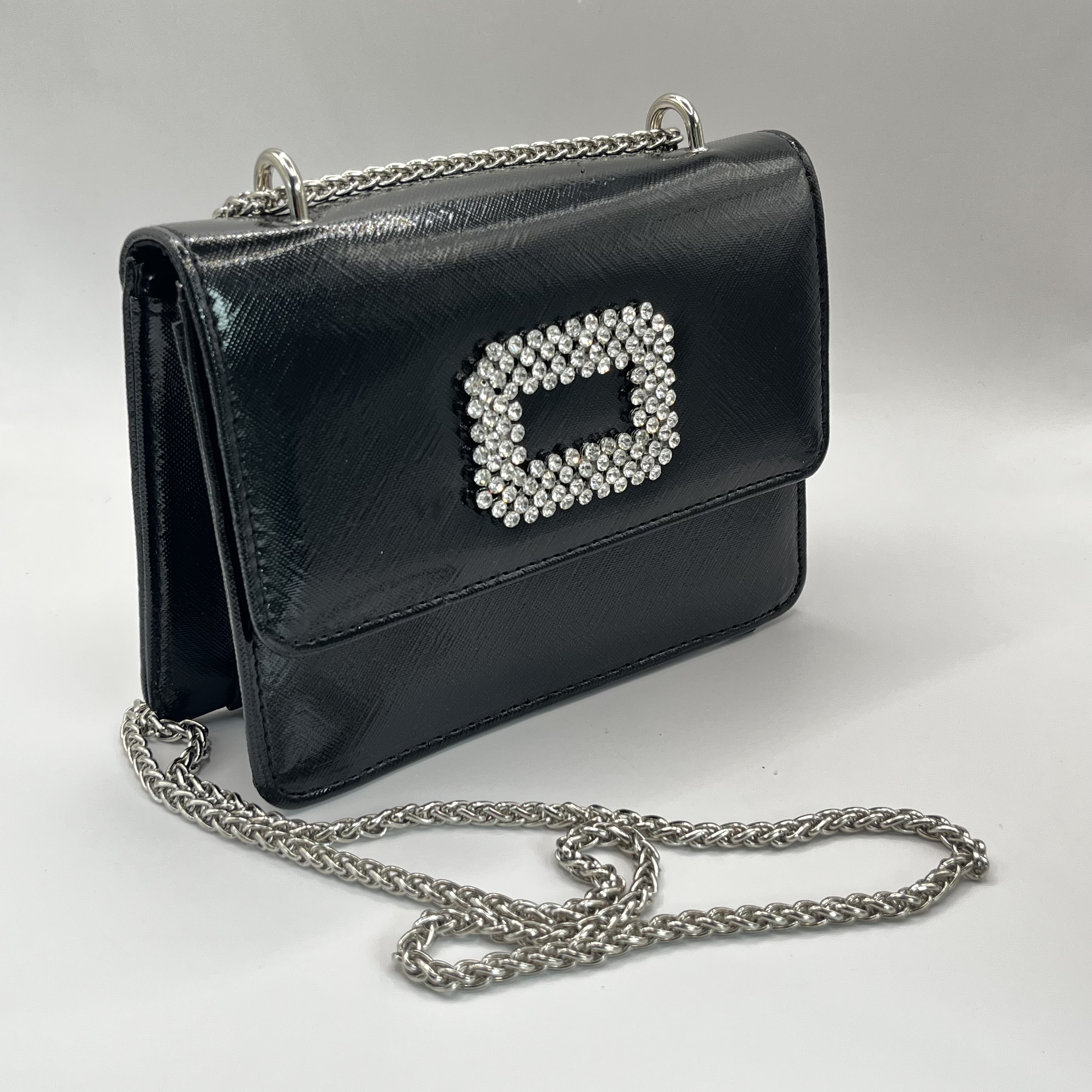 Cartera de fiesta con hebilla brillante negra 1