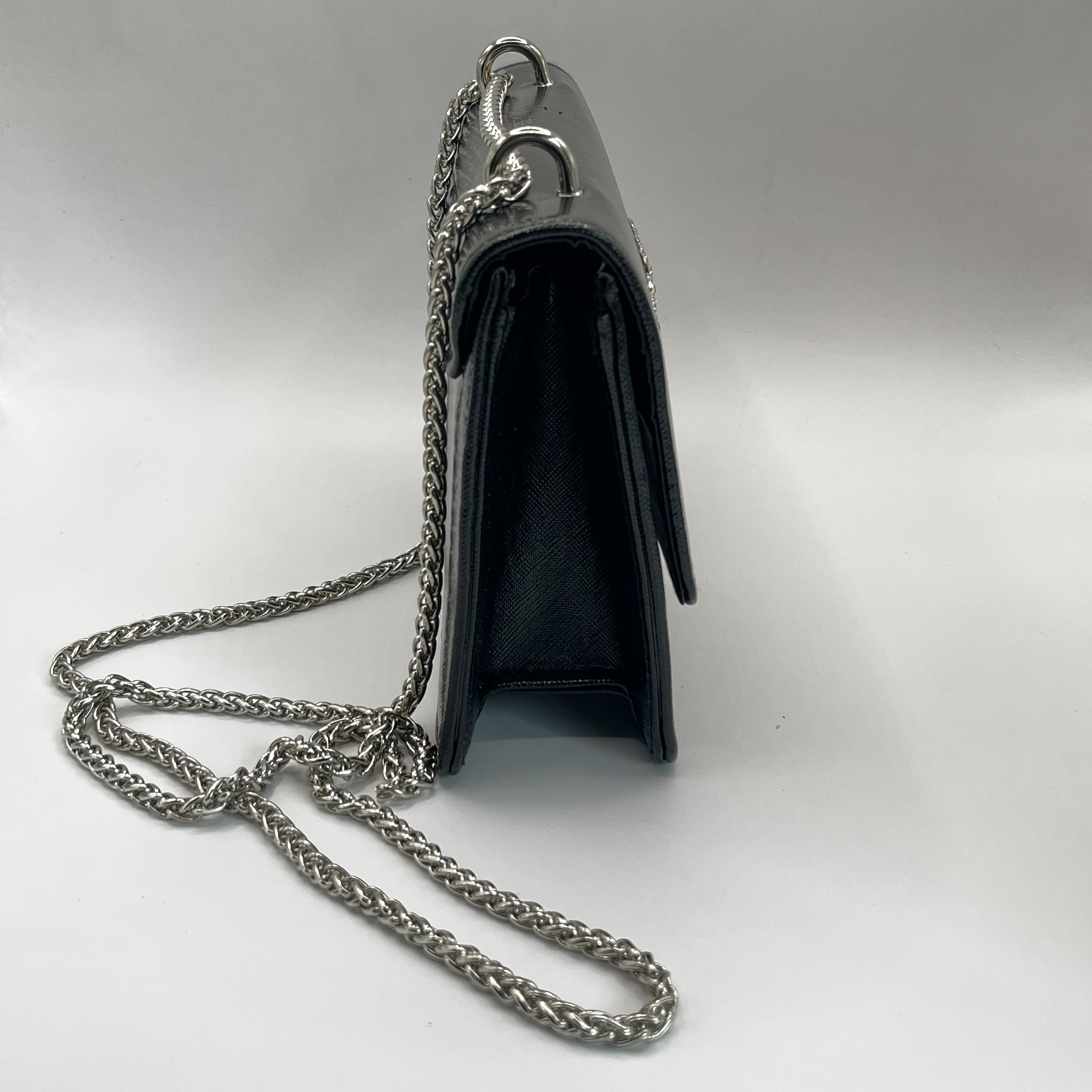 Cartera de fiesta con hebilla brillante negra 2