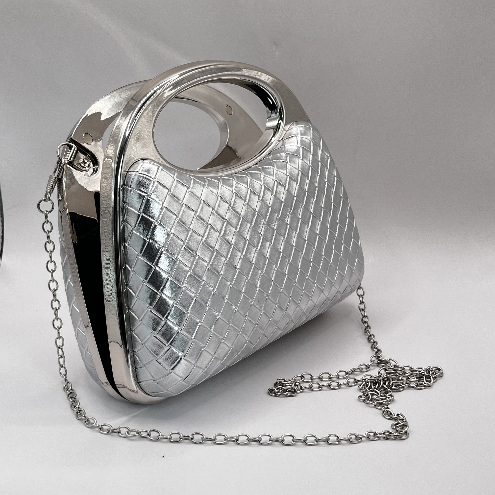 Cartera de fiesta rígida plateada 1