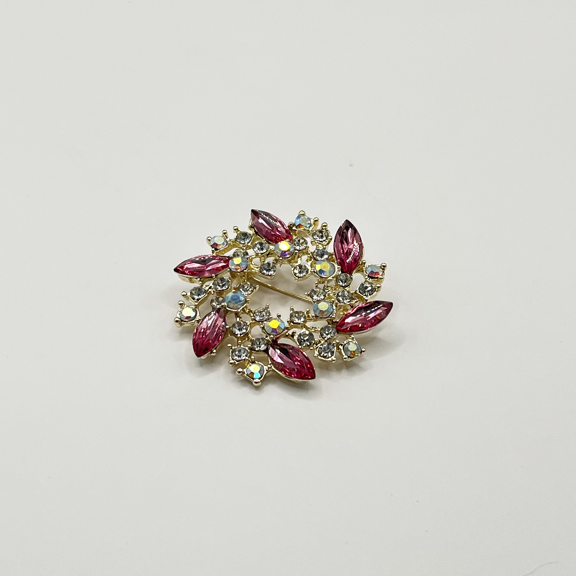 Prendedor corona fucsia 1