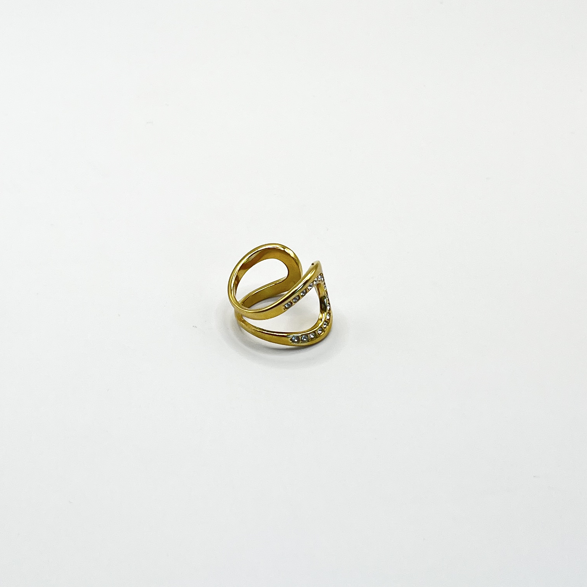 Anillo ajustable dorado con cristales curvos 1