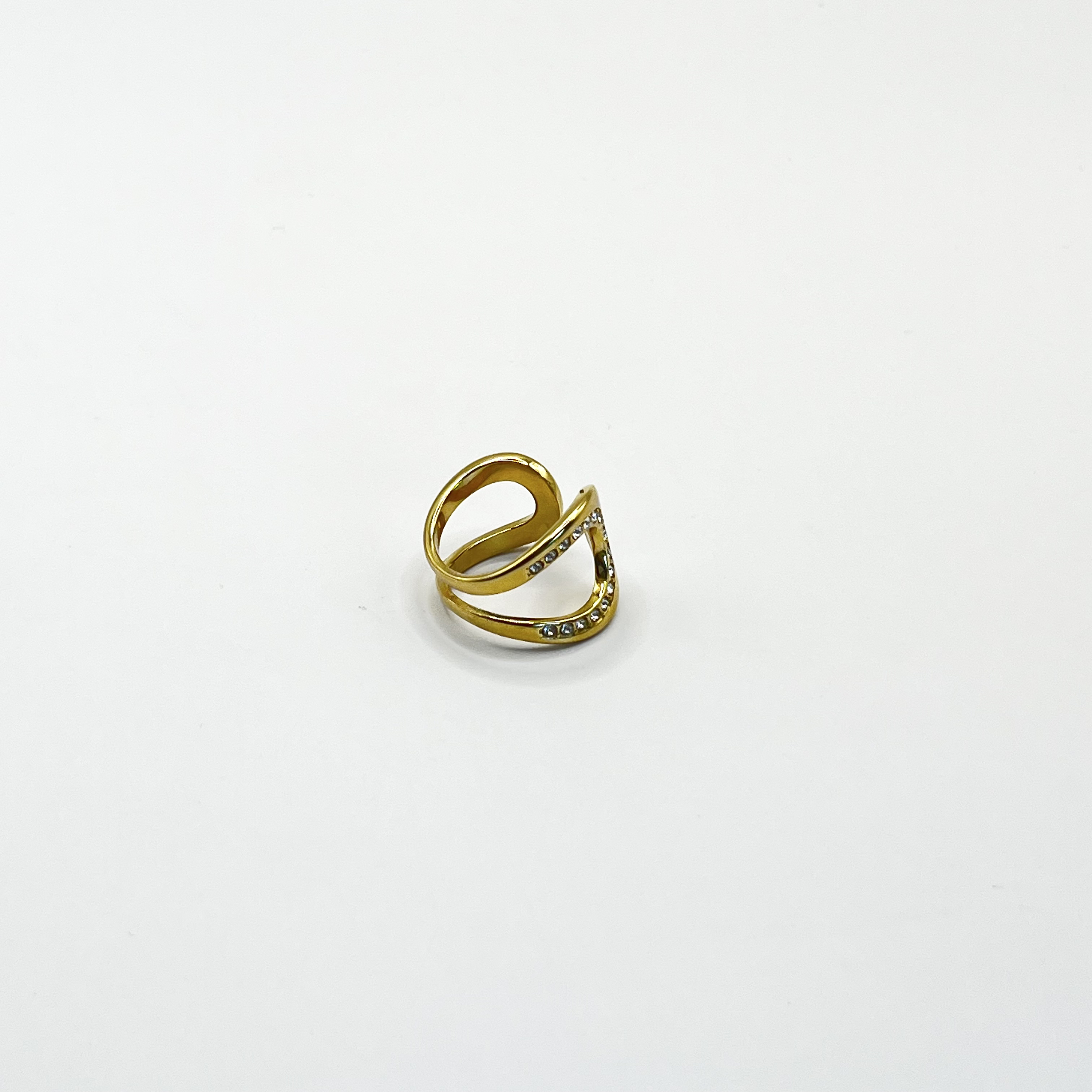 Anillo ajustable dorado con cristales curvos 1