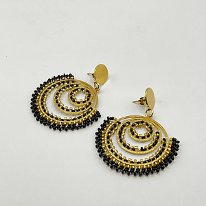 Aros bohemios negros y dorados