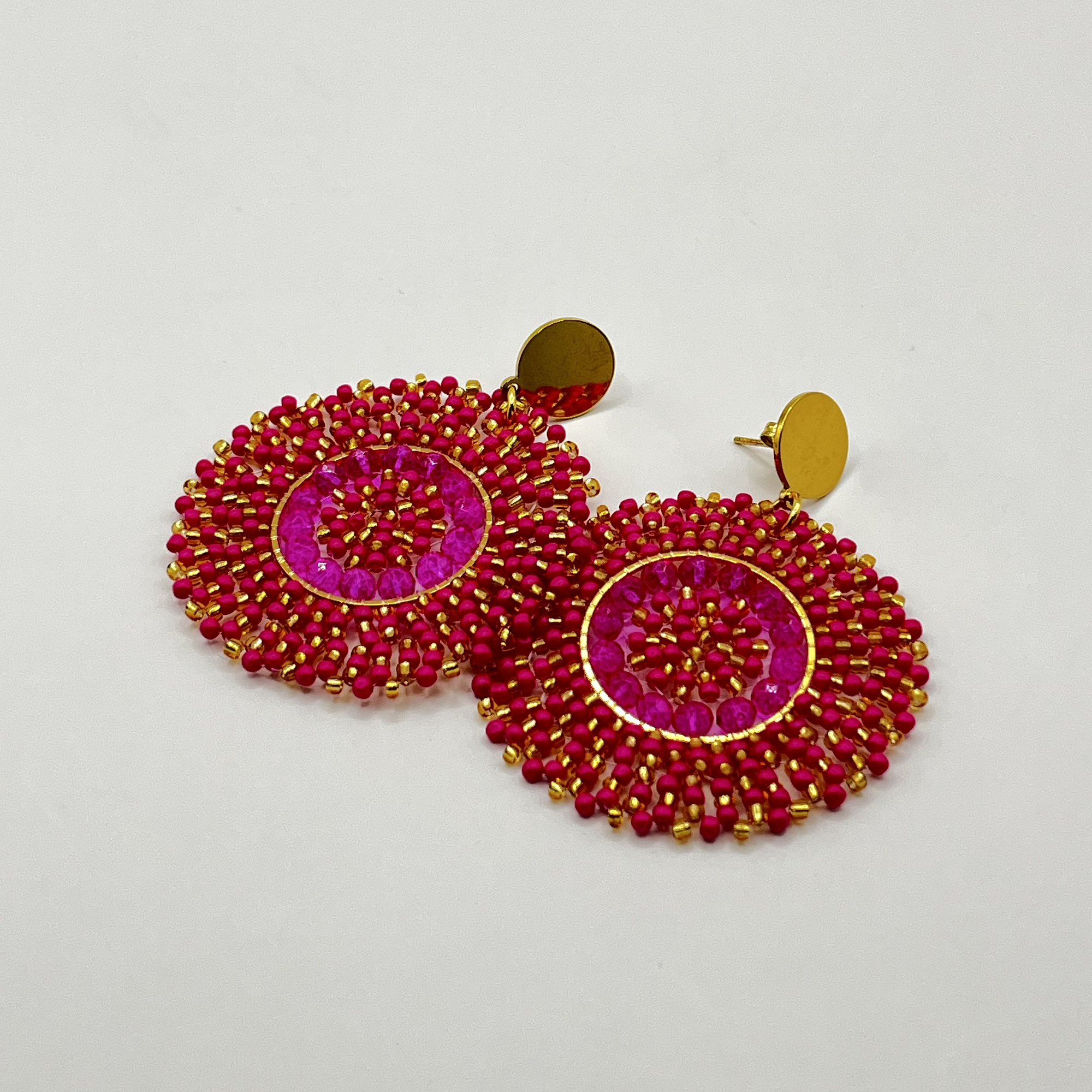 Aros bohemios fucsia con dorado 1