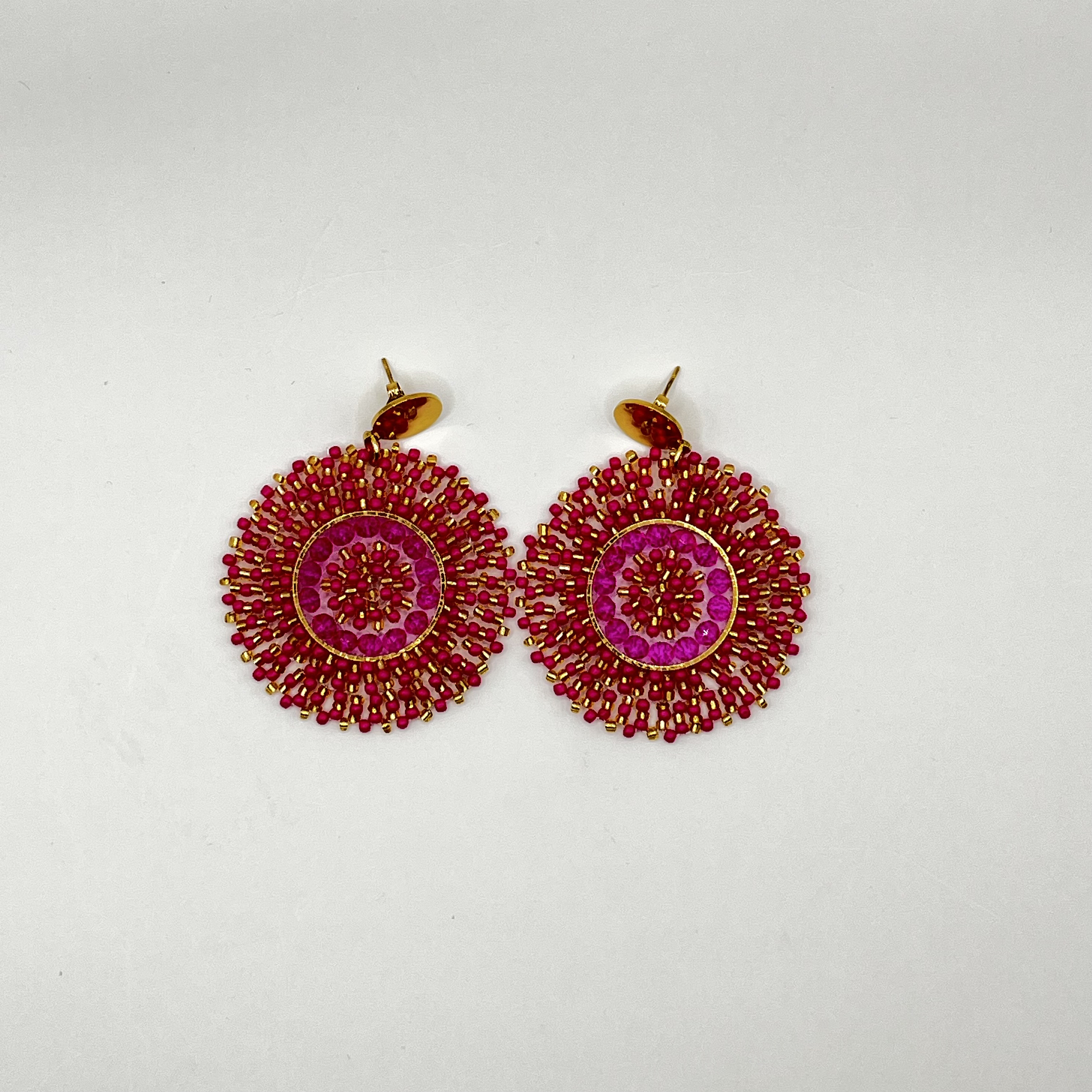 Aros bohemios fucsia con dorado 2