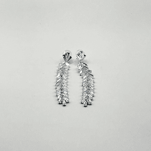 Aros de rodio plateados largos espiga de circones