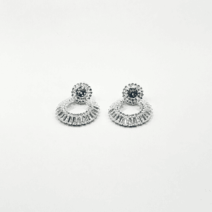 Aros de rodio plateados circulares de circones