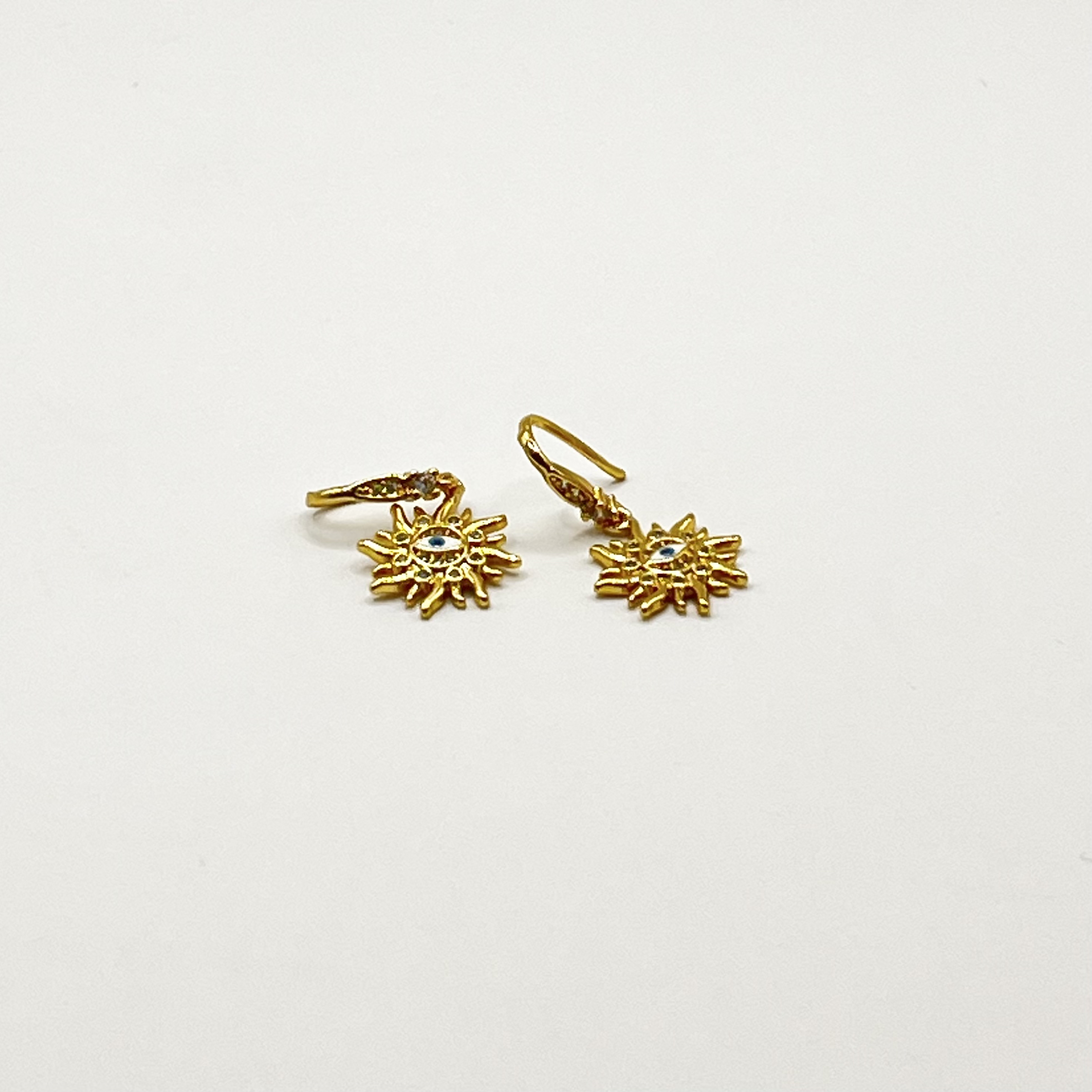 Aros de rodio dorados sol con ojo 1