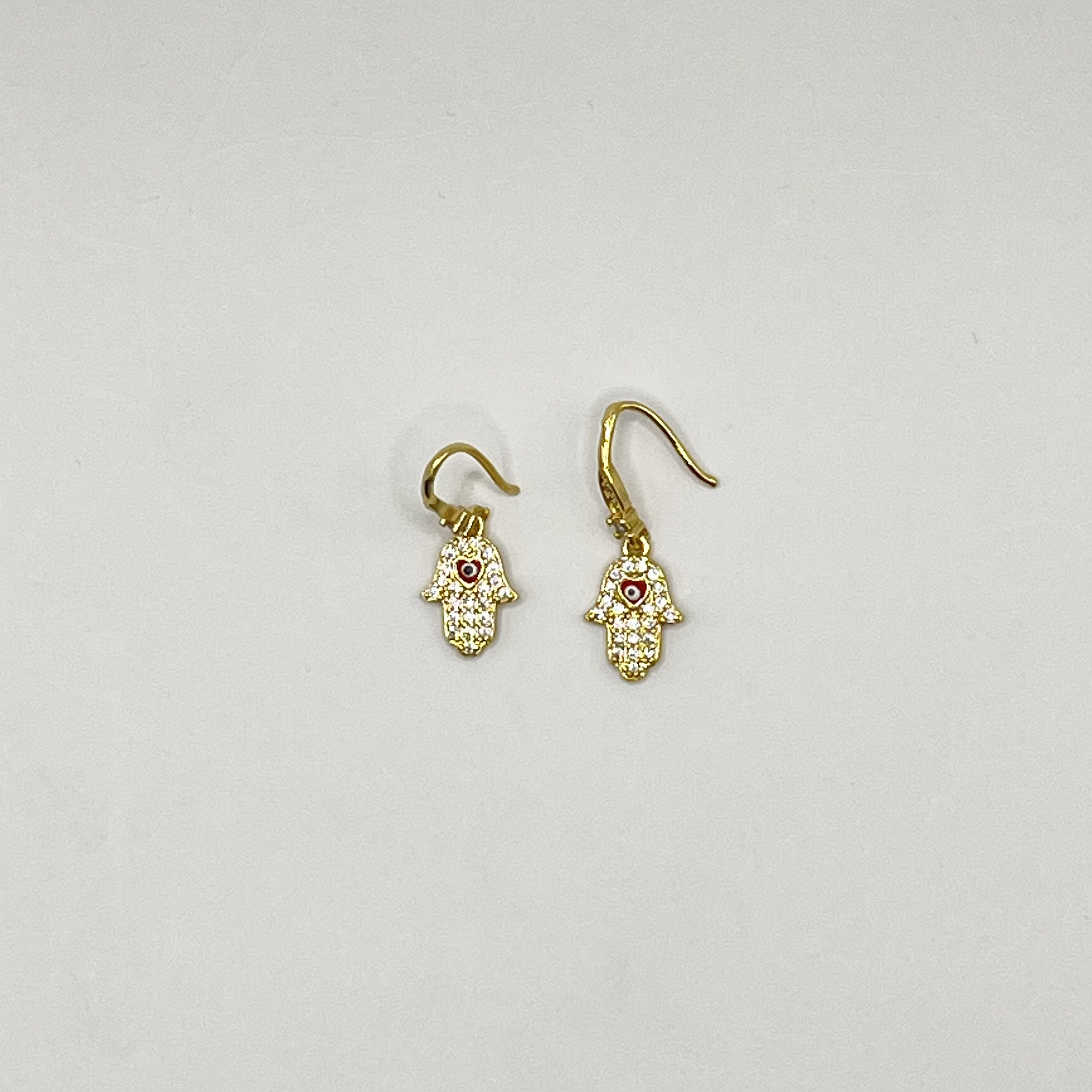 Aros de rodio dorados mano de Fátima 1