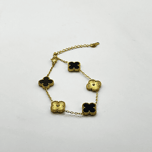 Pulsera de acero quirúrgico y nácar con flores negras y doradas