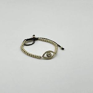 Pulsera de acero quirúrgico dorada con ojo místico ajustable