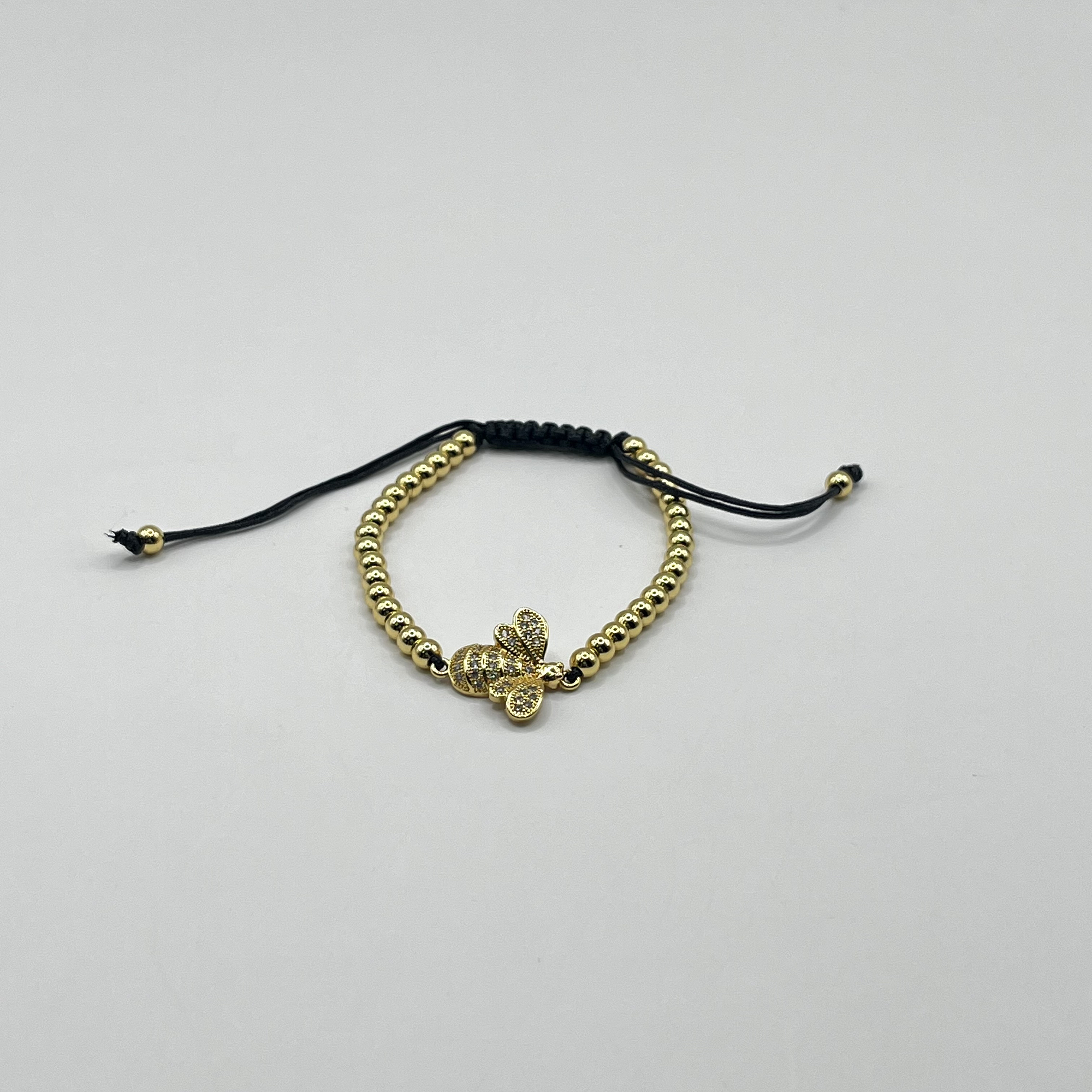 Pulsera de acero quirúrgico dorada con abeja ajustable 1