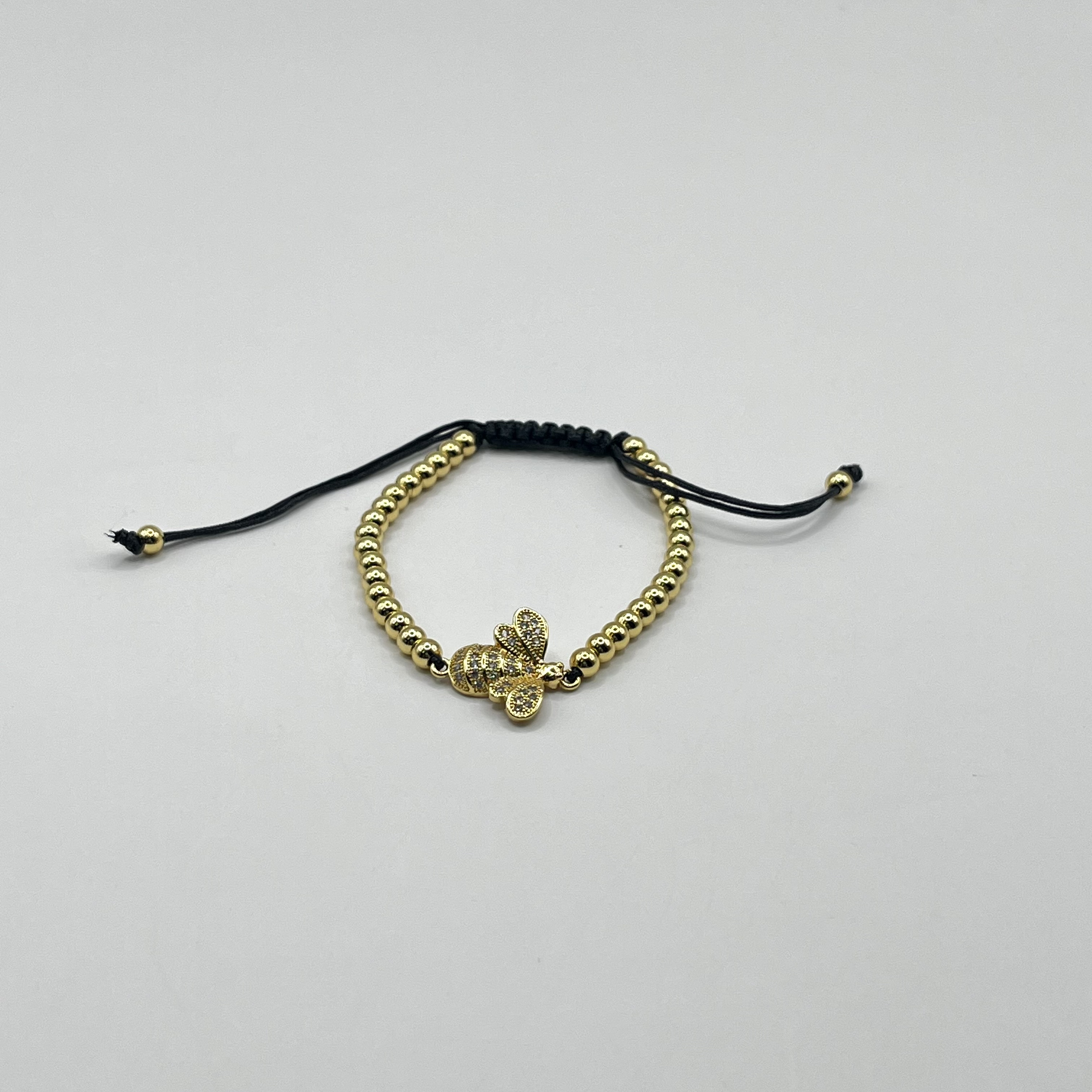 Pulsera de acero quirúrgico dorada con abeja ajustable 1