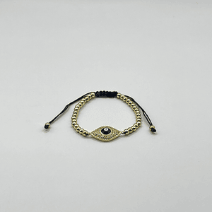 Pulsera de acero quirúrgico dorada con ojo místico ajustable