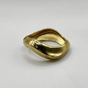 Pulsera esclava de fantasía dorada curva