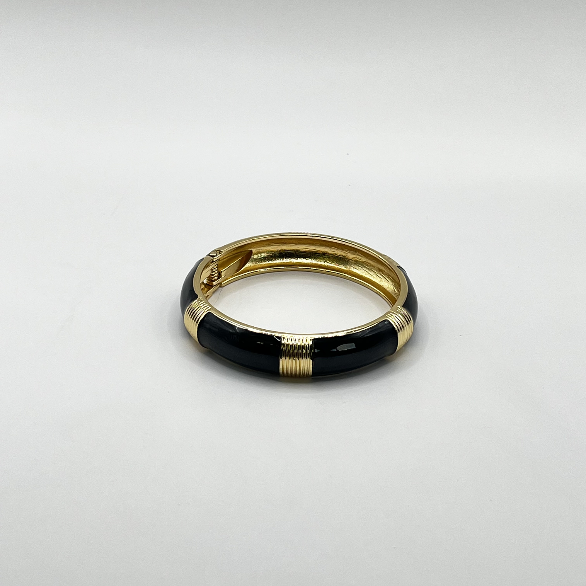 Pulsera esclava de fantasía negra con dorado 1