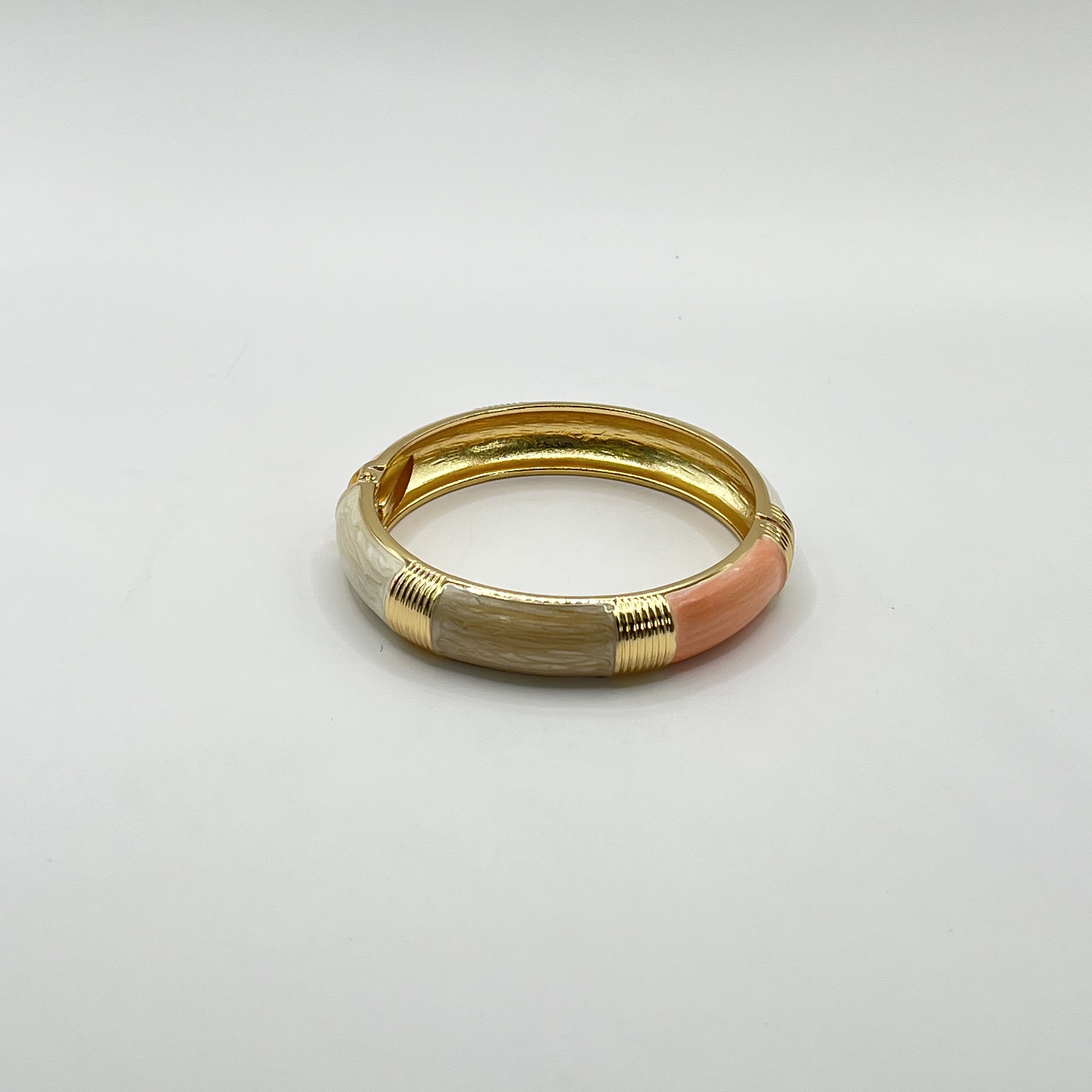 Pulsera esclava de fantasía rosada con dorado 1