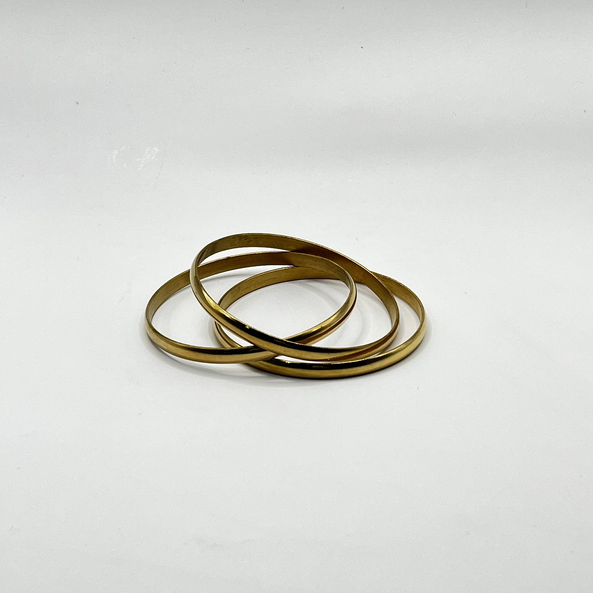 Set de 3 pulseras esclava de acero quirúrgico doradas 1