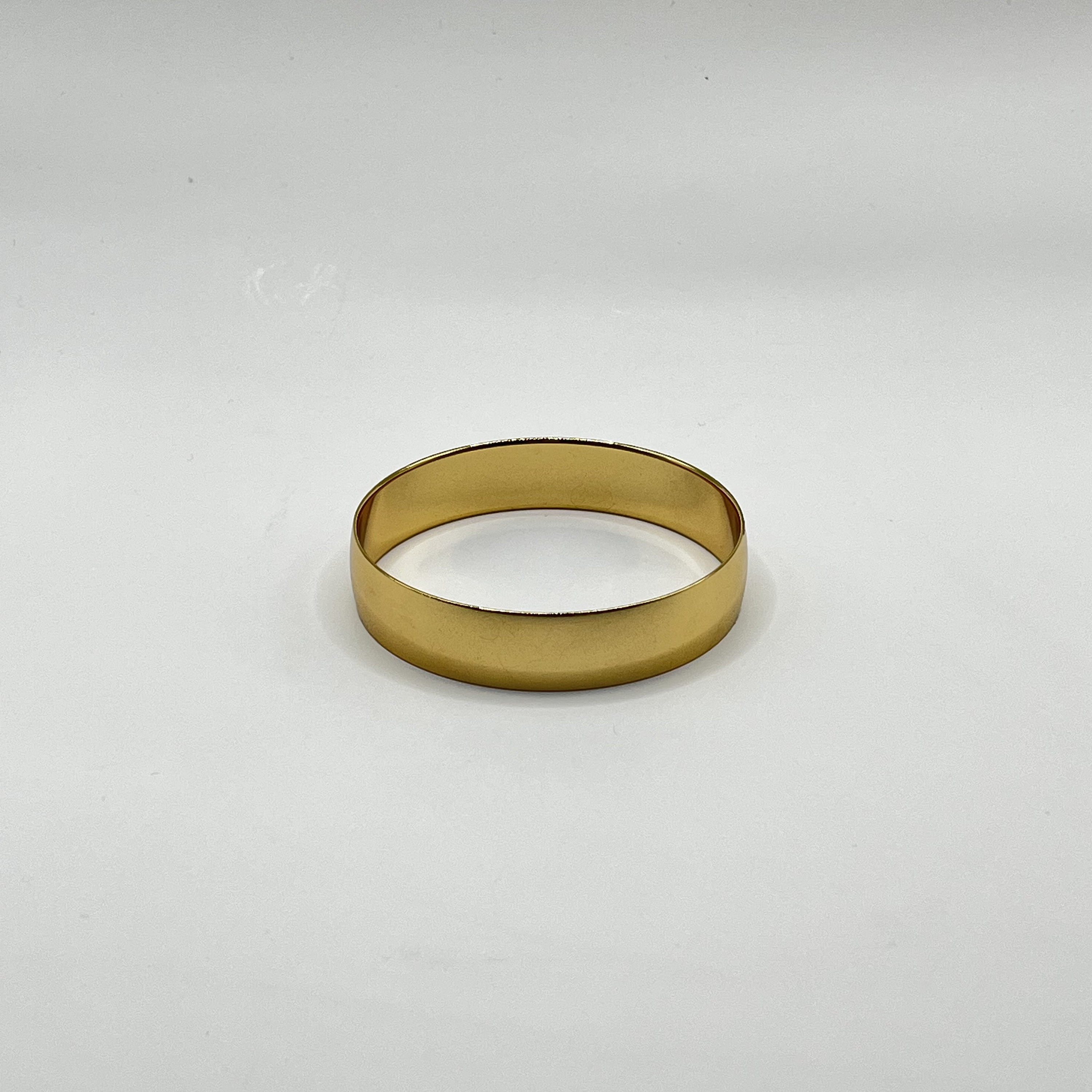 Pulsera esclava de acero quirúrgico dorada satinada 1