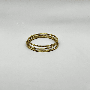 Set de 3 pulseras esclava de acero quirúrgico doradas texturadas