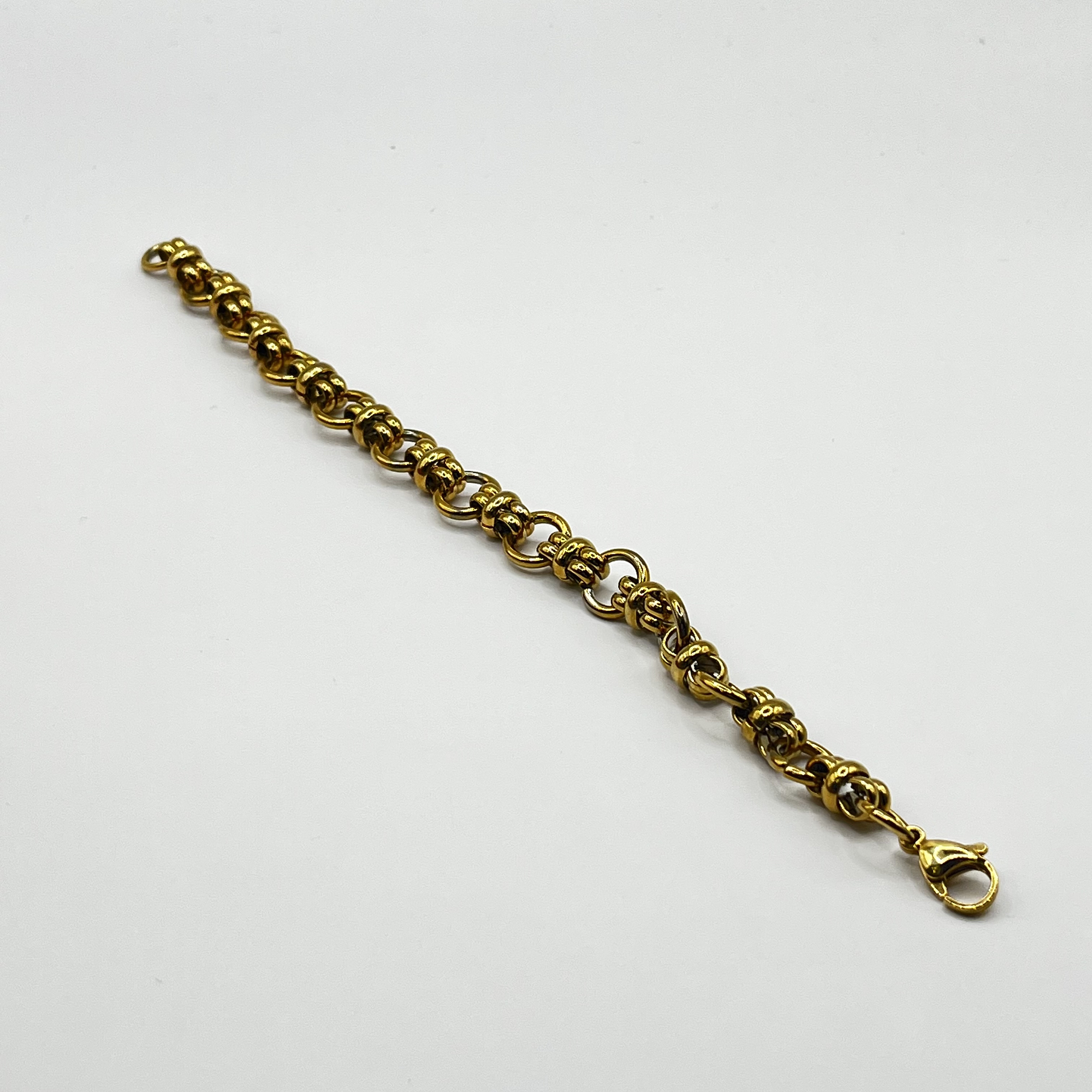 Pulsera de acero quirúrgico dorada de cadena circular trenzada 2