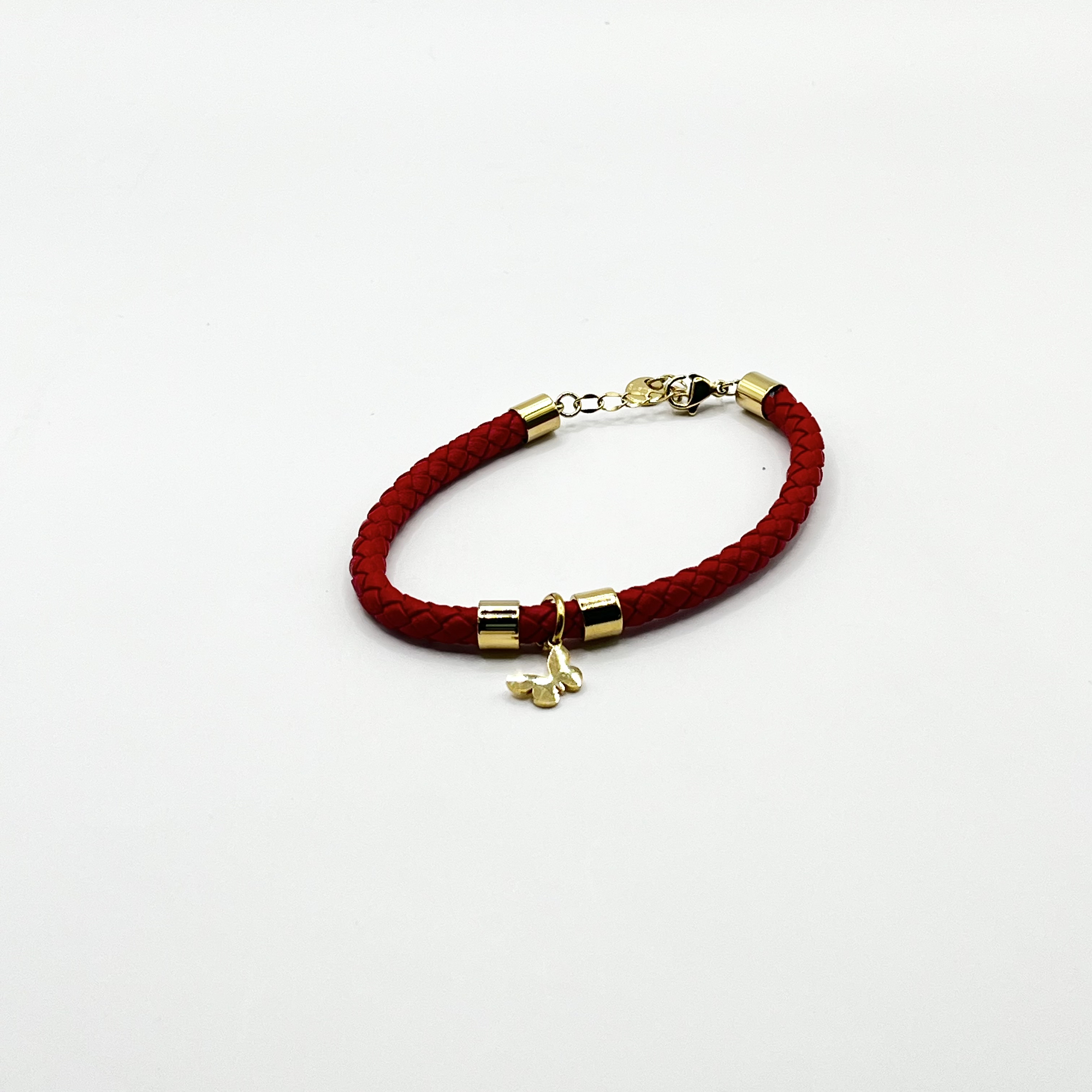 Pulsera de acero quirúrgico con cuero rojo y dije de mariposa 1