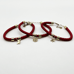 Pulsera de acero quirúrgico con cuero rojo y dije de árbol de la vida
