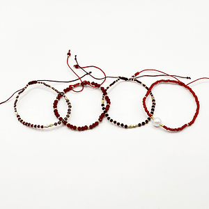 Set de 4 pulseras de acero quirúrgico con hilo ajustable y cristales