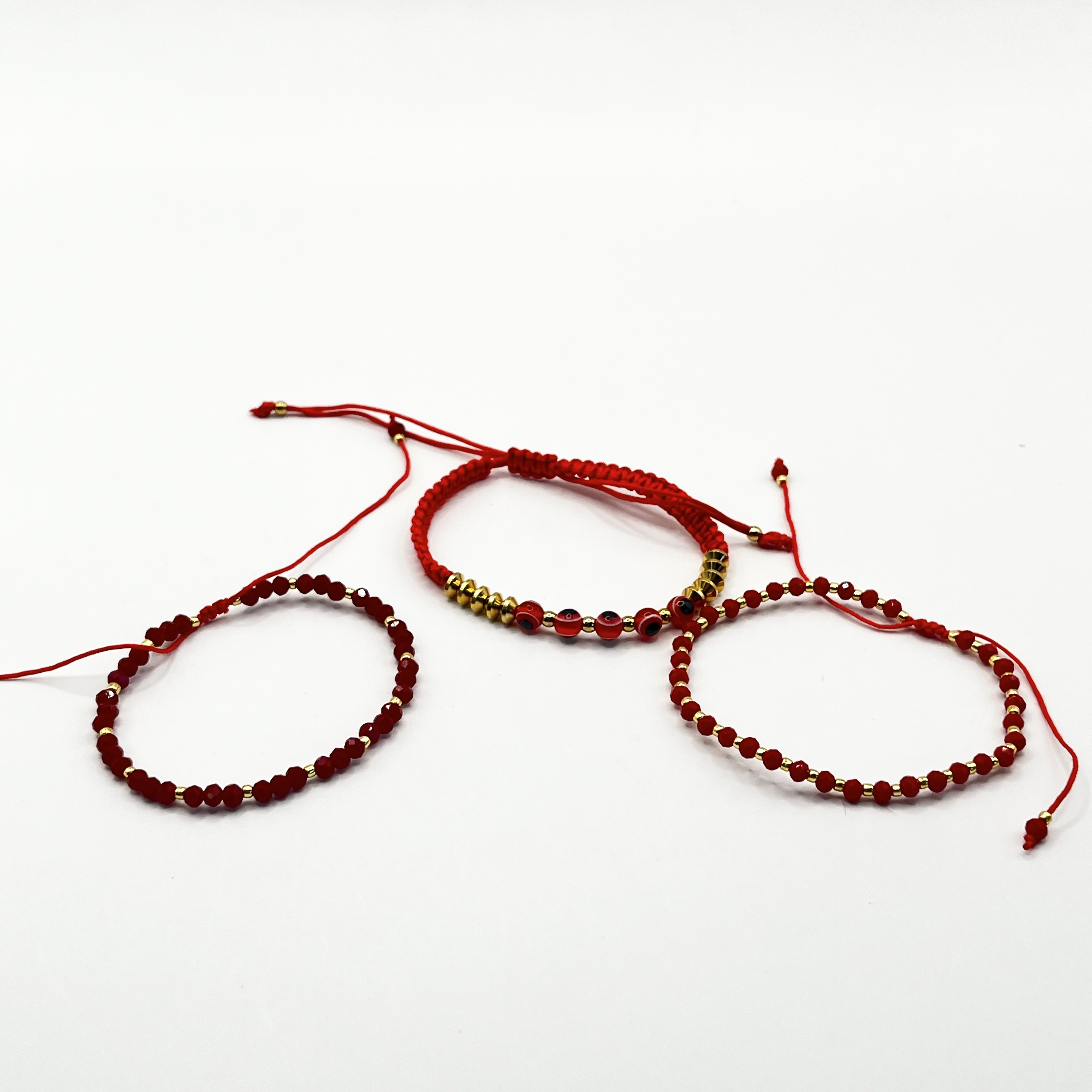 Set de 3 pulseras de acero quirúrgico con hilo ajustable 1