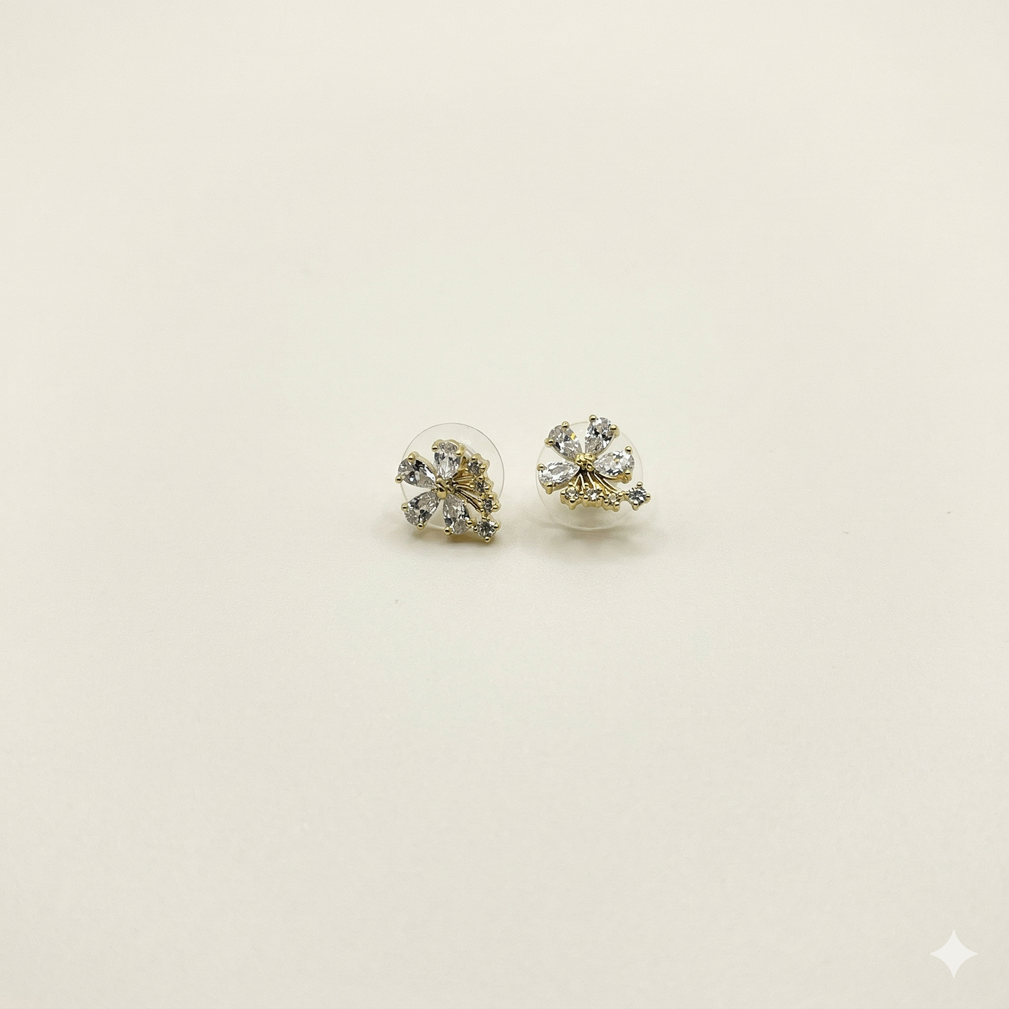 Aros de rodio dorados flor de cristales 1
