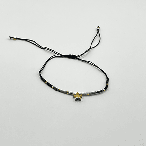 Pulsera de acero quirúrgico con estrella dorada ajustable