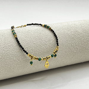 Pulsera de acero quirúrgico con cristales negros, verdes y mano de Fátima