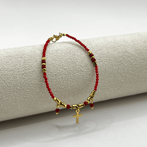 Pulsera de acero quirúrgico roja con cruz dorada