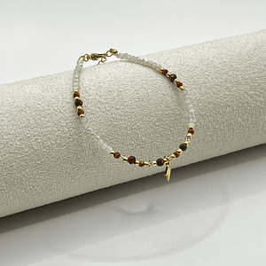 Pulsera de acero quirúrgico con cristales blancos y rayo dorado