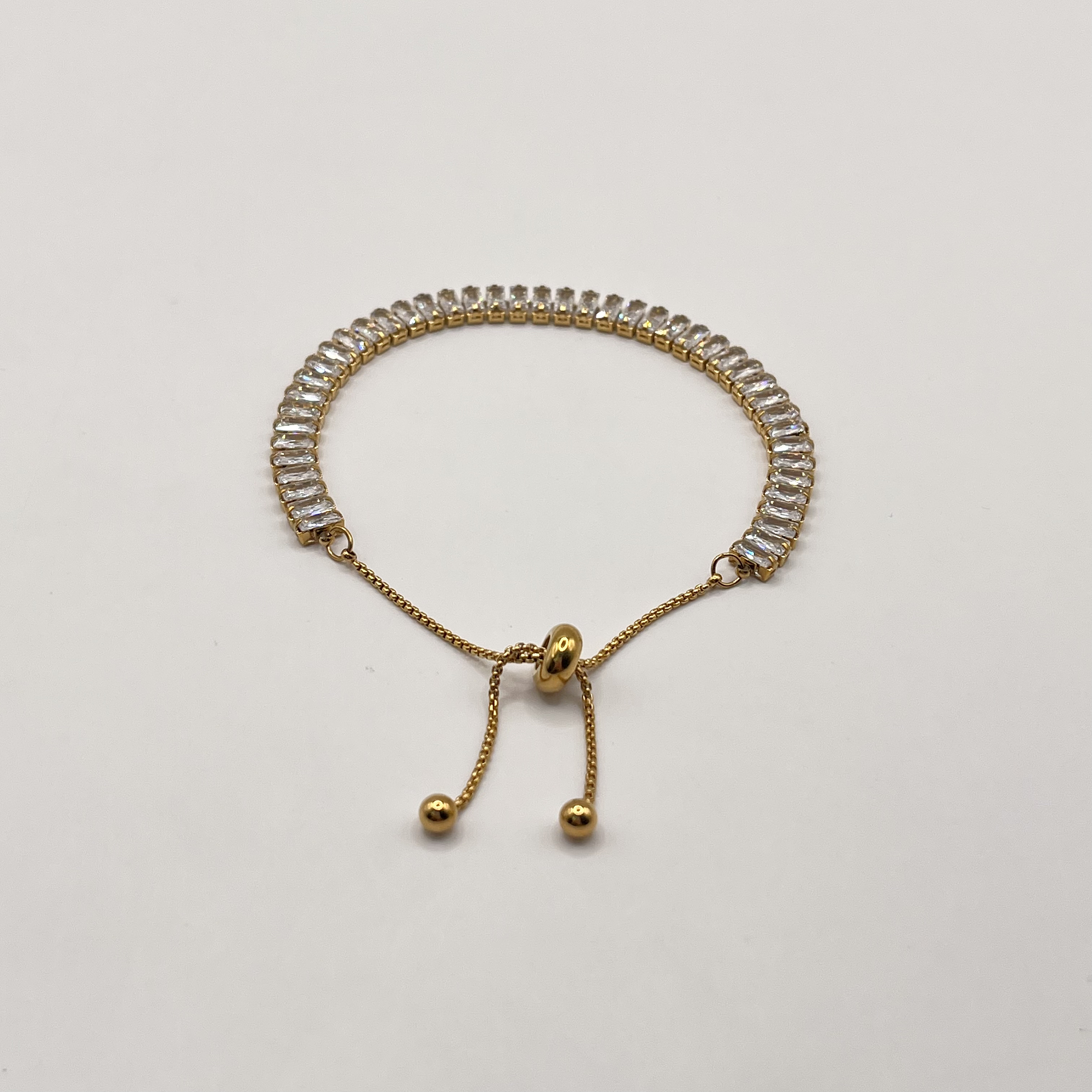 Pulsera de acero dorada ajustable con cristales rectangulares 1