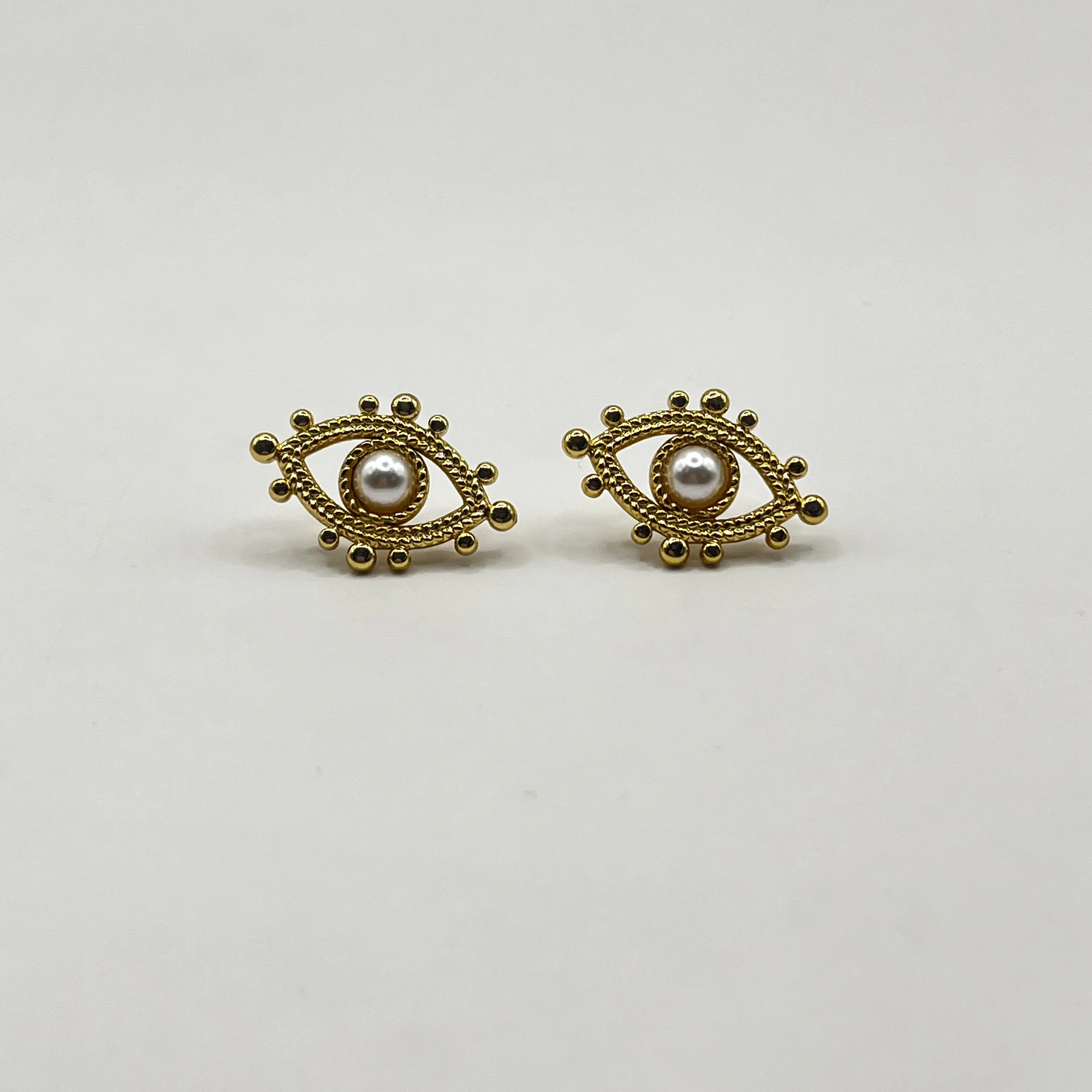 Aros de acero quirúrgico de ojos perla dorados 2