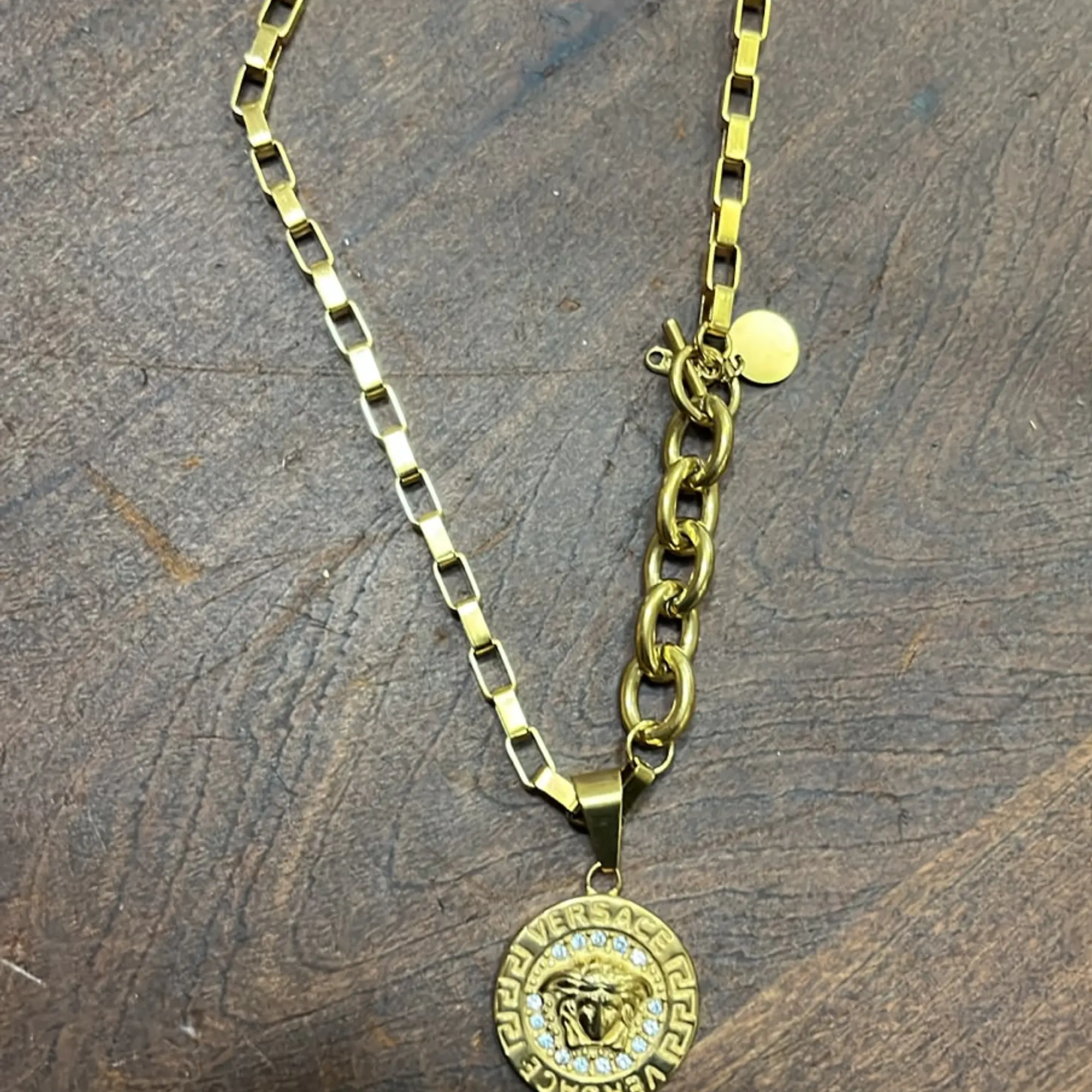 Collar de acero quirurgico con cadena con broche timón y dije de acero  1