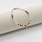 Pulsera de acero quirúrgico con cristales blancos y rayo dorado - Miniatura 1