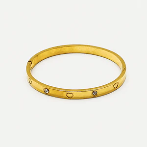 Pulsera esclava dorada con corazones y brillo
