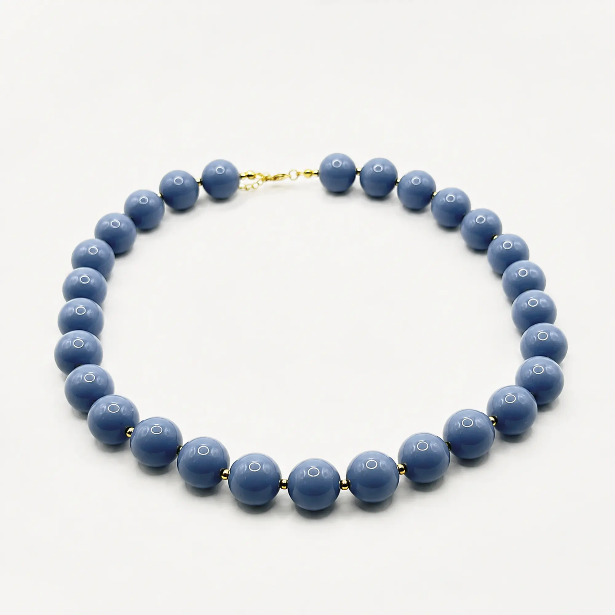 Collar de acero quirúrgico y esferas azules 1