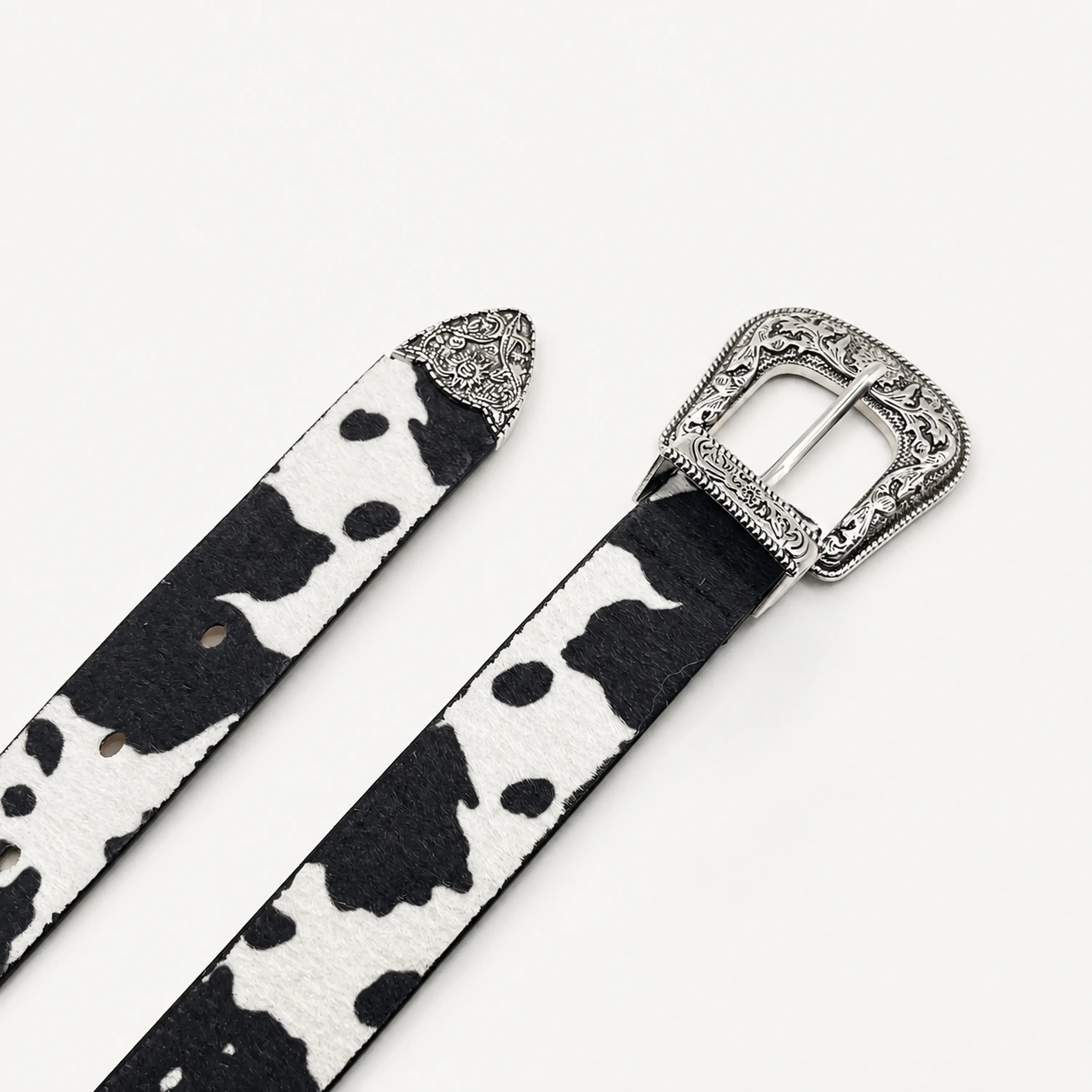 Cinturón animal print de vaca con hebilla vaquera 3