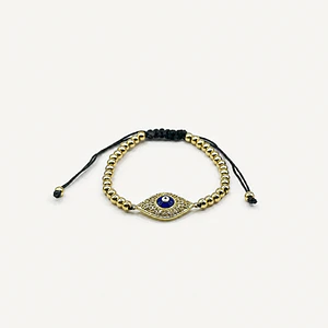Pulsera de acero quirúrgico dorada con ojo místico ajustable