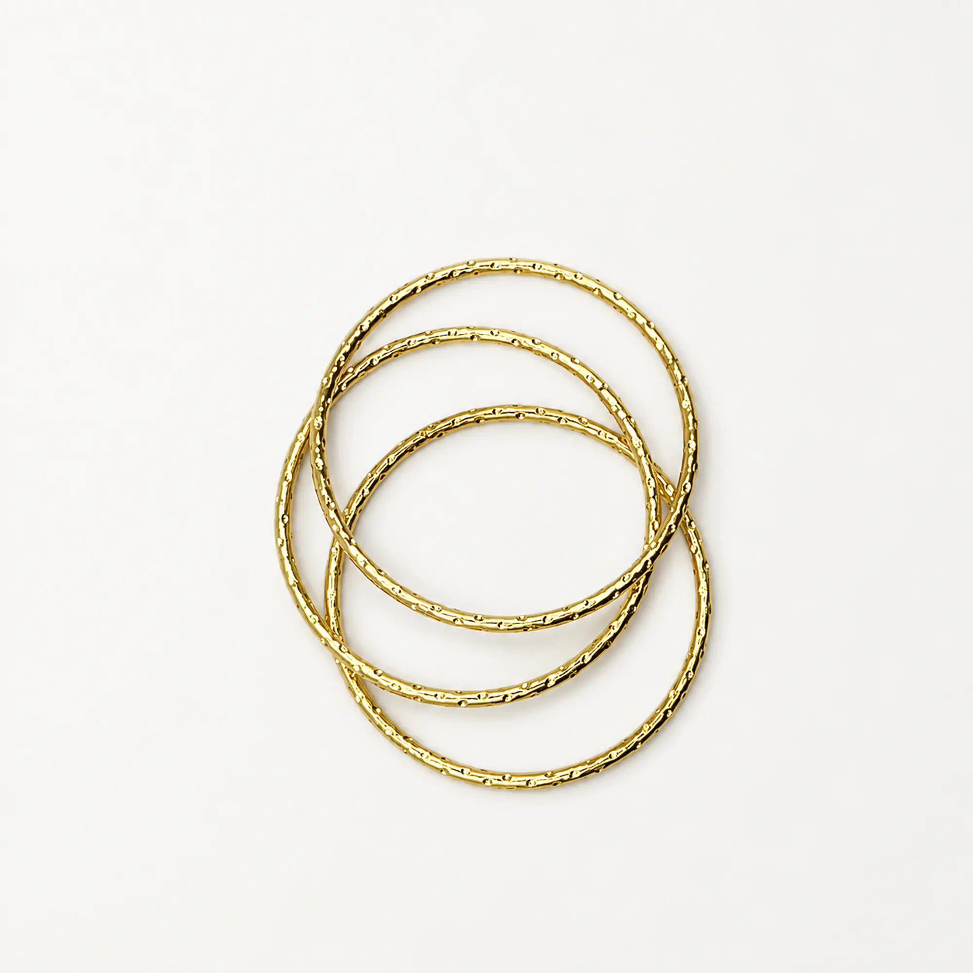 Set de 3 pulseras esclava de acero quirúrgico doradas texturadas 1