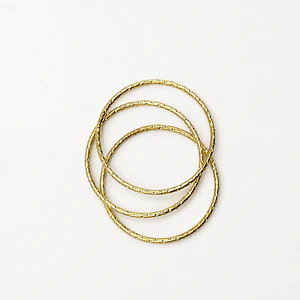 Set de 3 pulseras esclava de acero quirúrgico doradas texturadas