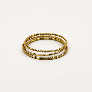 Set de 3 pulseras esclava de acero quirúrgico doradas texturadas