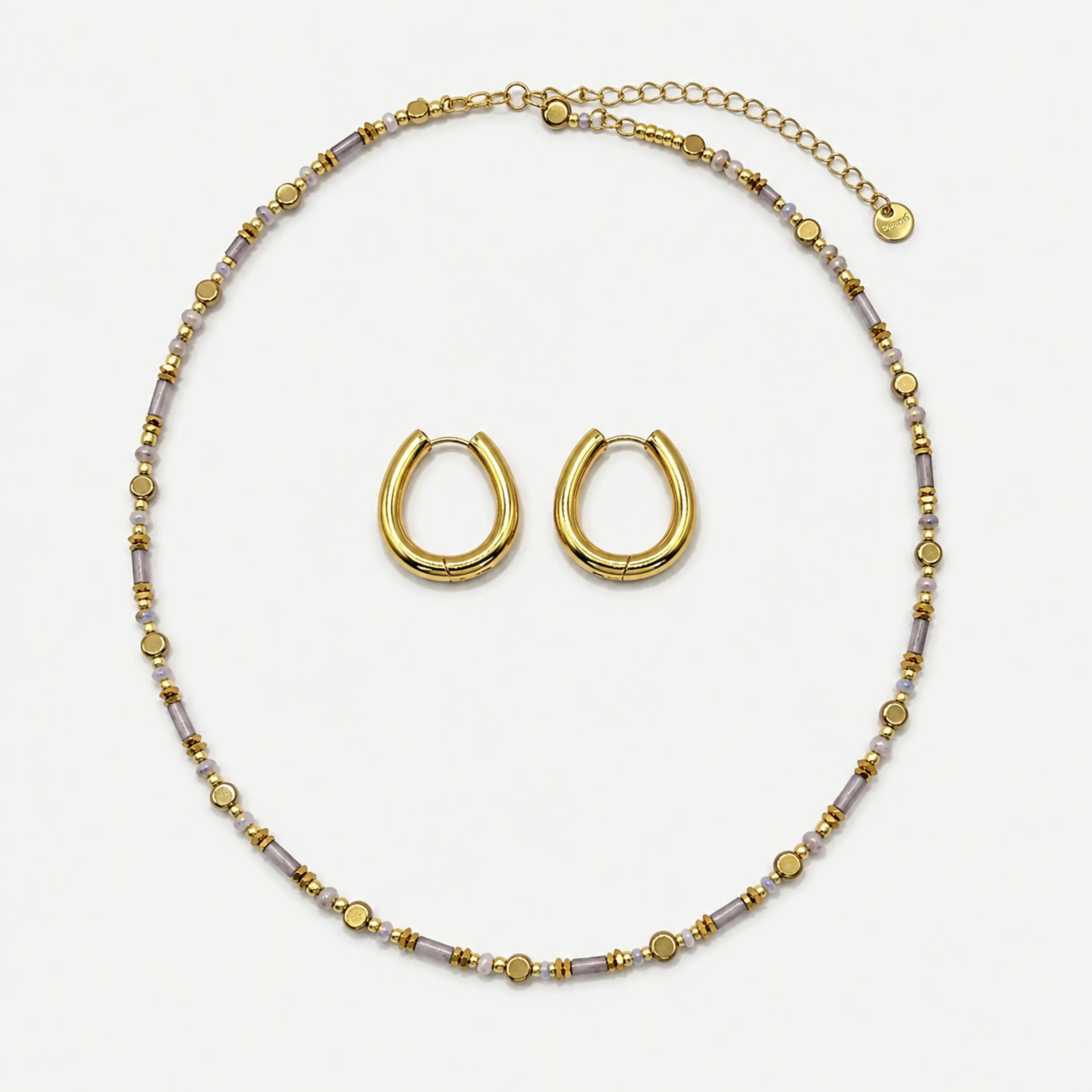 Conjunto de acero quirúrgico con choker lila y argollas doradas 1