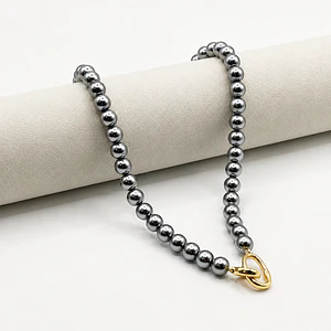 Collar de acero quirúrgico con perlas grises