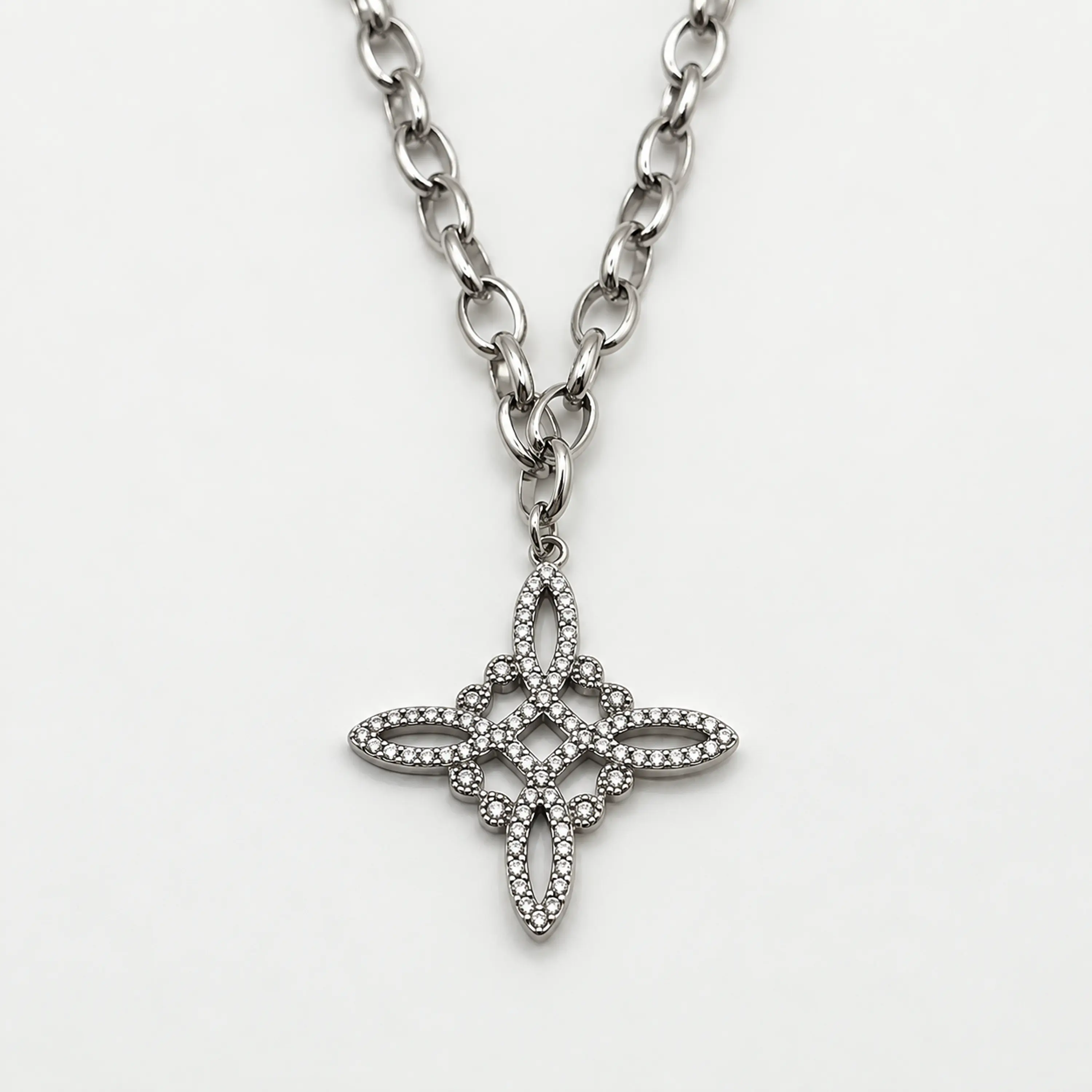 Collar de acero quirúrgico plateado con dije nudo de bruja con brillos 2